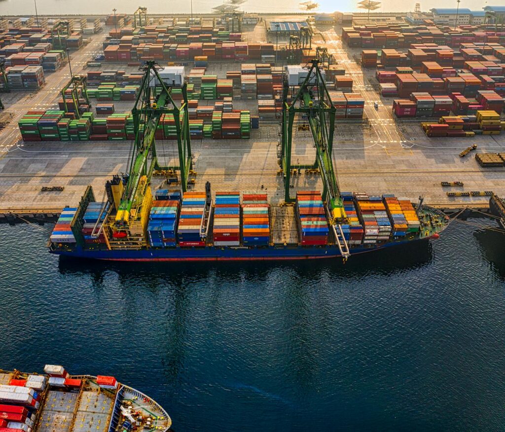 drone-shot-of-a-cargo-ship-on-port-3856433 Drone Shot of a Cargo Ship on Port